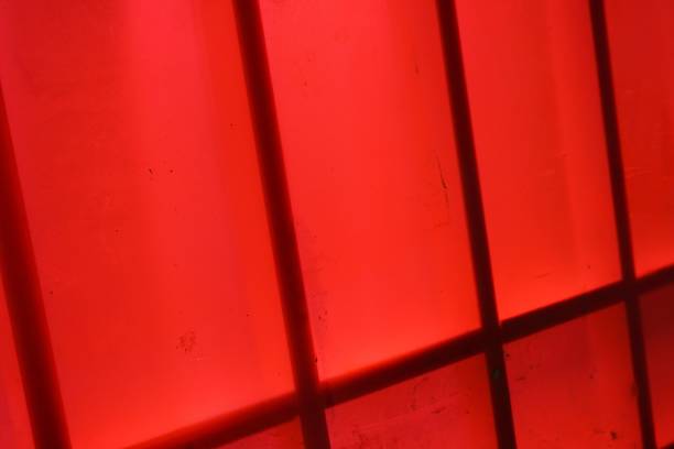 istock red plastic fabric on wood wall texture 915582298