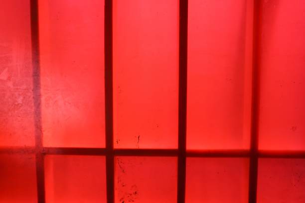 istock red plastic fabric on wood wall texture 915582346