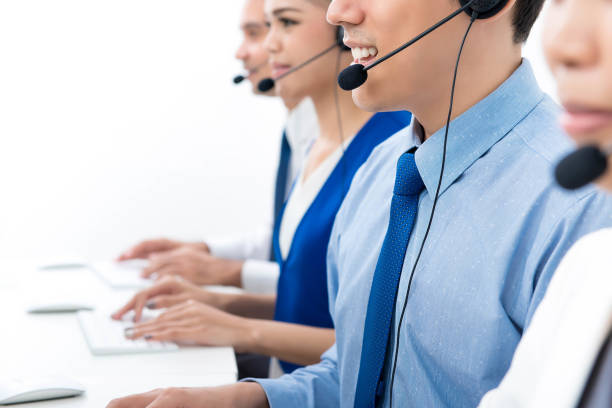 istock Call centre agents talking on the phone to customers 915587088