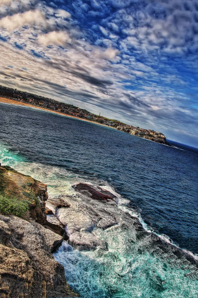 Bondi Beach Sydney, Australia Bondi Beach Sydney, Australia taken in 2015 bondi beach sunrise stock pictures, royalty-free photos & images