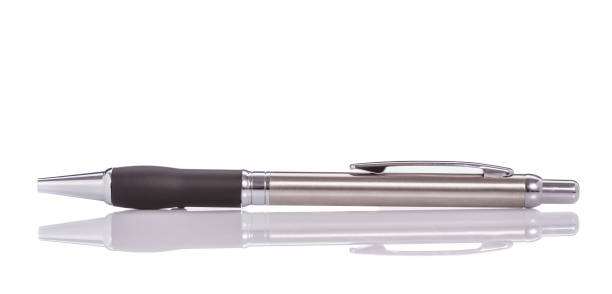 istock New silver ballpoint pen. Studio shot isolated on white 915594960