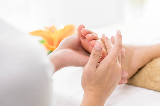 thai foot massage with aroma therapy and reflexology - thai ethnicity massaging thailand thai culture imagens e fotografias de stock