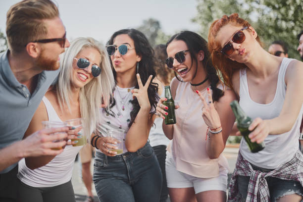 istock Big crowd of people having a party 915604722