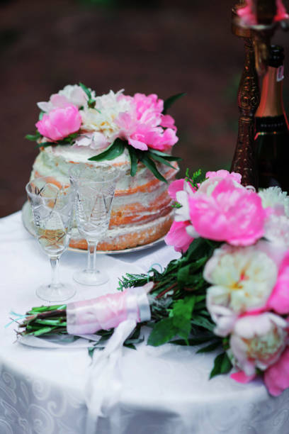 istock beautiful wedding decorations champagne flowers and cake 915607884