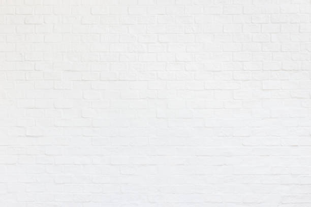 istock White brick wall. Abstract decoration wall texture and background. For wallpaper design and backdrop 915609864