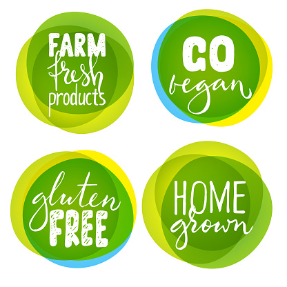 Set of four healthy food labels with lettering. Vegan food stickers.