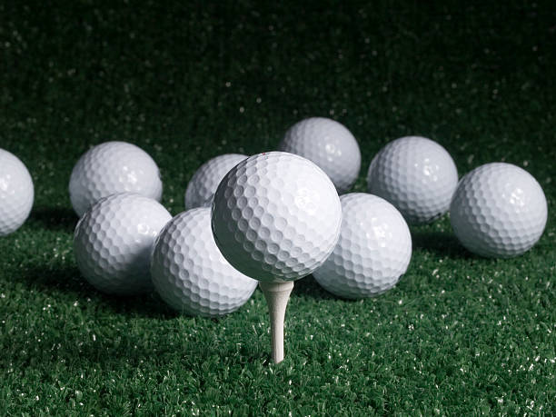 istock Golf Ball on Tee with Scattered Balls 91561713