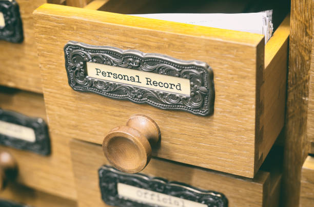 istock Old wooden archive files catalog drawer, personal record files 915625498