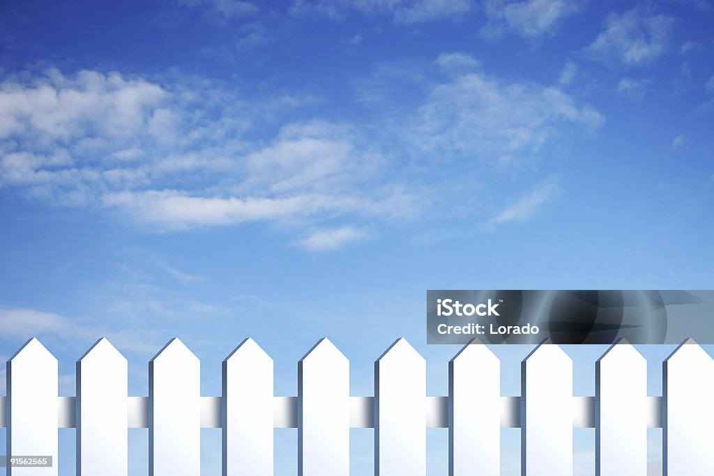 blue sky and fence blue sky and white fence Picket Fence Stock Photo