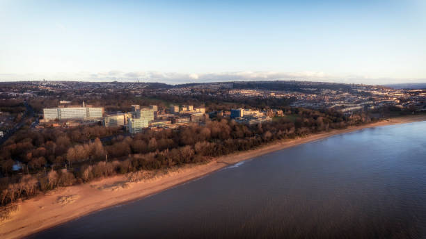 Swansea Bay and University Editorial Swansea, UK - February 4, 2018: Singleton Hospital and Swansea University both of which have exceeded capacity and have expanded into other areas of the city swansea stock pictures, royalty-free photos & images