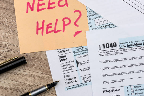 istock 1040 tax form with sticker - need help 915633454