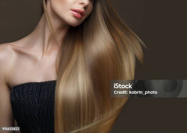 Beautiful Blond Girl With A Perfectly Smooth Hair Classic Makeup Beauty Face Stock Photo - Download Image Now