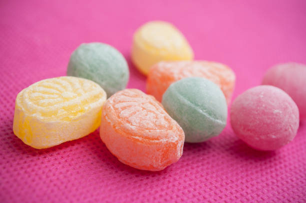 istock traditional candies on pink background 915643776