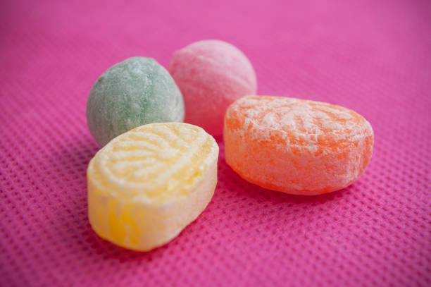istock traditional candies on pink background 915643780