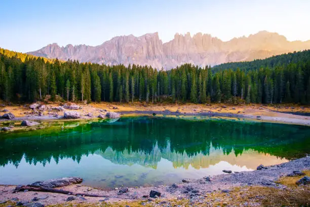 Carezza lake( (Lago di Carezza) ) and Mount Latemar in Dolomites Alps . Italy