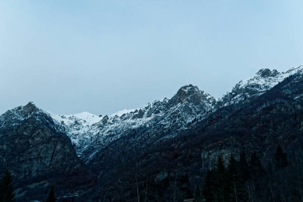 istock Winter landscape. Trees, mountains, sky and clouds covered with fresh snow. Italy, Alagna 915645896