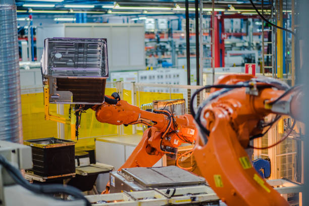 istock Industrial robotic arm lifting machine part 915648430