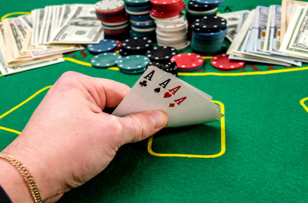 istock four aces in the player's poker hand 915648582