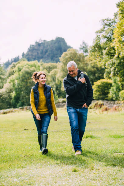 istock Senior Couple Hiking Together 915652626