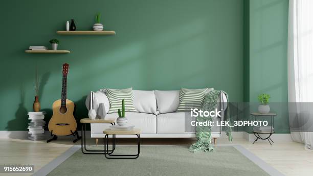 Modern Mid Century And Minamalist Interior Of Living Room Eco Space Concept Design White Sofa And Green Plant On Green Wall And Wood Floor 3d Render Stock Photo - Download Image Now