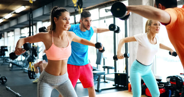 istock Two attractive fitness girls doing exercise 915655414