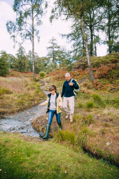istock Senior Couple Exploring the Woodlands 915655832