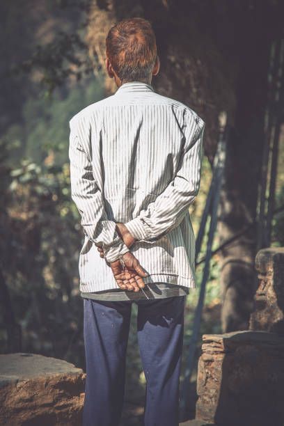 Business Man's hand in handcuff, crime arrested concept