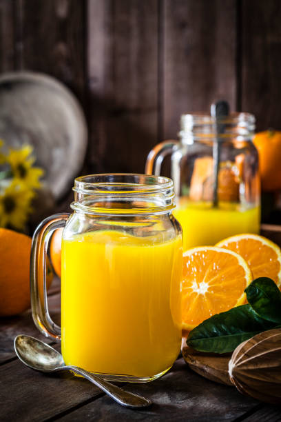 istock Preparing orange juice at home 915657250