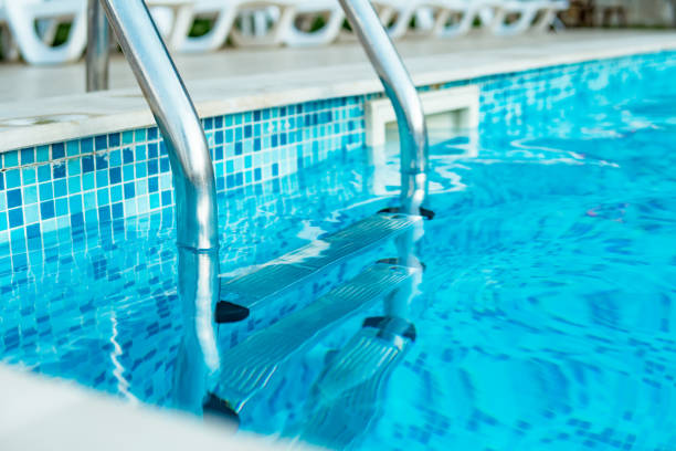 Swimming pool with stair at luxury hotel stock photo