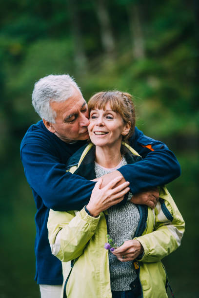istock Senior Couple Kissing 915660736