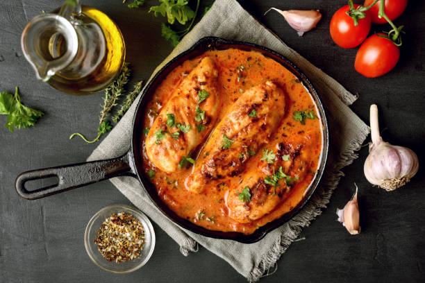 istock Chicken breast in tomato sauce 915660996