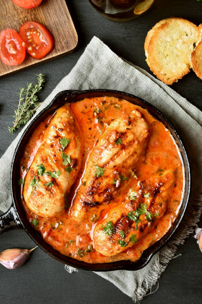istock Chicken breast in tomato sauce 915661008