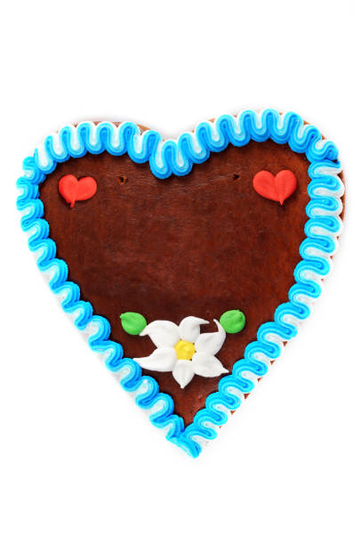 istock Gingerbread heart cookie for Beer Fest with copy space on white isolated background 915664806