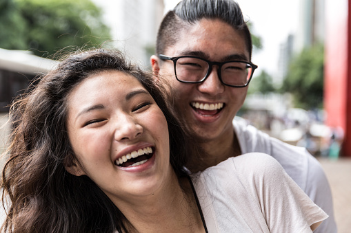 Portrait of Asian Couple Smiling