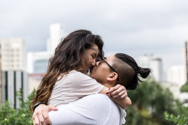 istock Romantic Asian Couple Meeting/Hugging 915669494