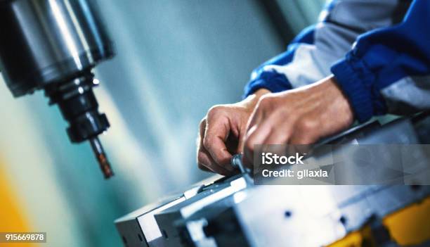 Assembly Line Worker Stock Photo - Download Image Now - Making, Machine Part, Factory