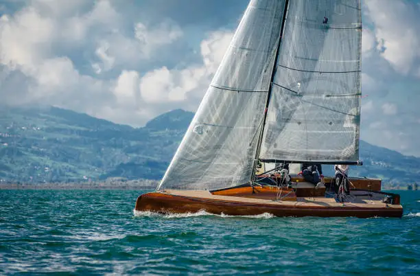 modern racing sailboat going upwinds