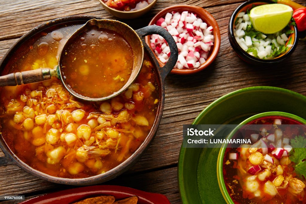 Pozole with mote big corn stew from Mexico Pozole with mote big corn stew from Mexico with ingredients and appetizer Appetizer Stock Photo
