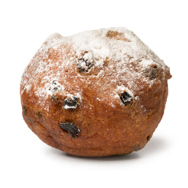 Single oliebol, traditional Dutch pastry for New Year's Eve stock photo
