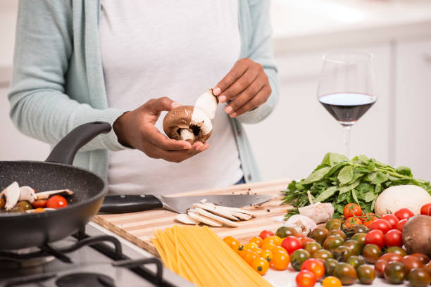 istock Close up woman cooking. 915676224