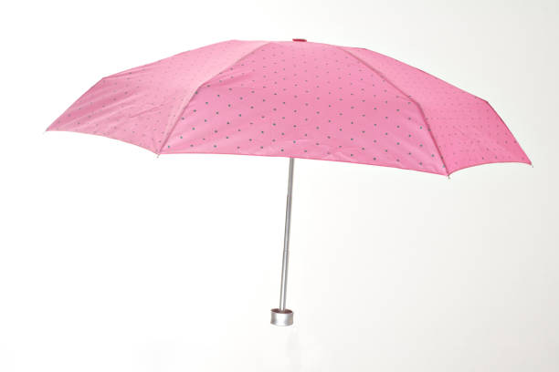 istock pink polkadot umbrella 91567741