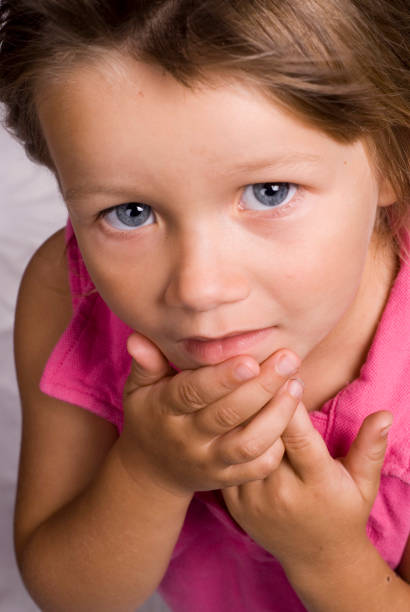 istock Child Holding Chin 91568130