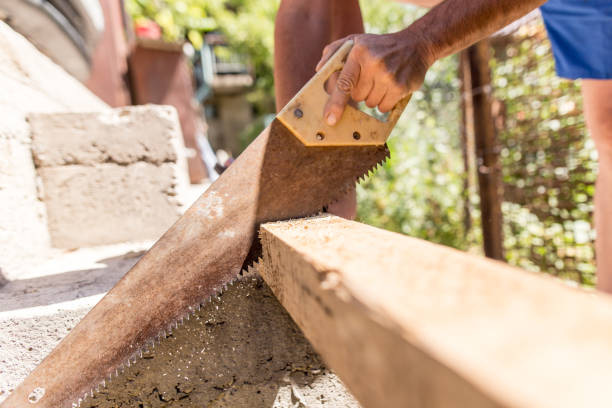 istock A man is sawing a beam of wood 915682980