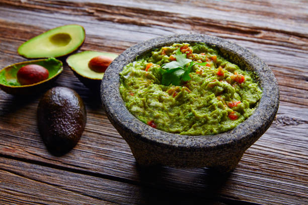 istock avocado Guacamole on molcajete real Mexican 915687166