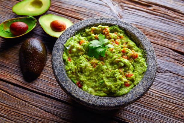istock avocado Guacamole on molcajete real Mexican 915687278