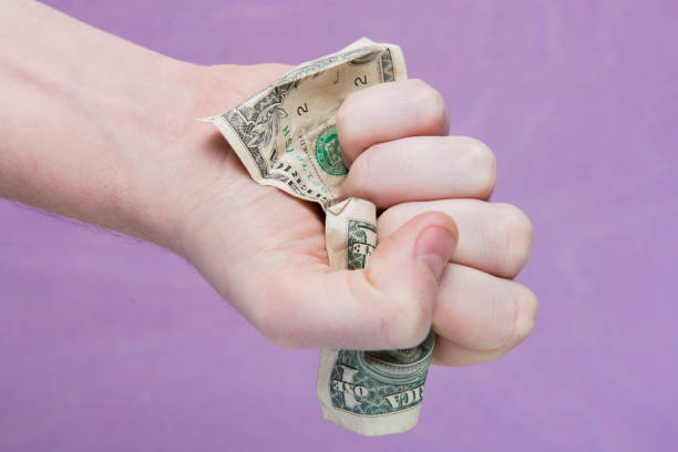 istock hand with money 915688408
