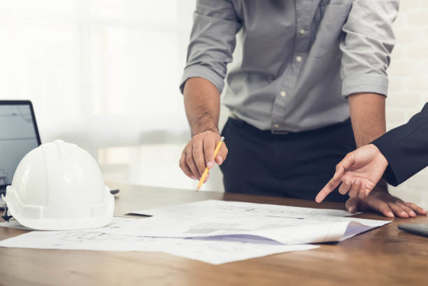 Architects discussing a project in the office