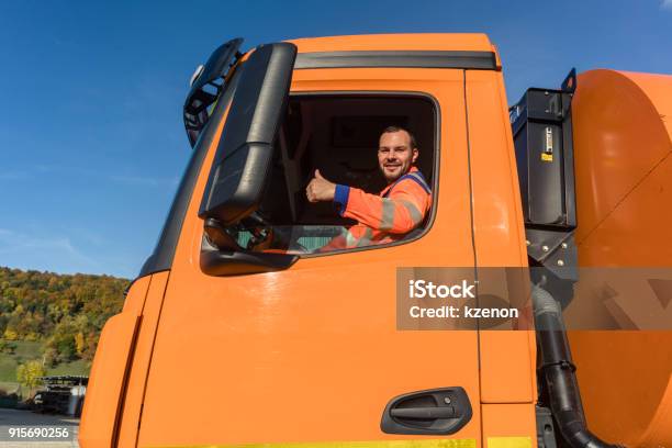 Waste Collector Driving Stock Photo - Download Image Now - Garbage Truck, Driver - Occupation, Driving