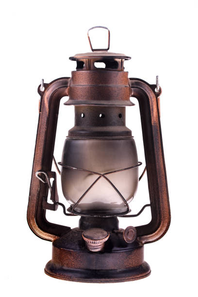 istock Gas lantern isolate on a white background. An antique vintage lamp. Hipster accessory. Camping light. Interior decoration. 915690596