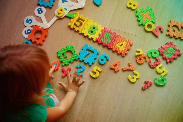istock little girl learning numbers and math 915695448